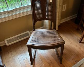 Rocking chair with woven cane seat and back
