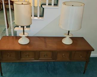 Cool mid century hall table with nice mid cen modern lamps.