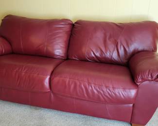 Like New Leather sofa. A must buy.