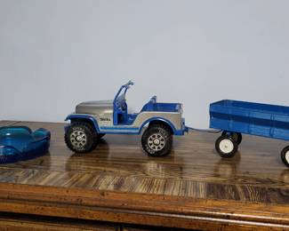 Very nice vintage tonka truck and trailer .