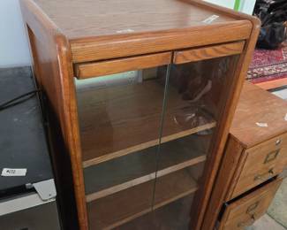 #171 Oak 3 shelf Entr. Center w/glass front doors - 21x16x44 $30.00
