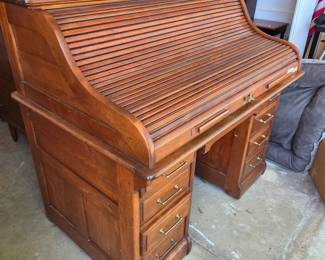 #165 Oak Roll-Top Desk w/cubbies w/9 drawers (as is finish) - You Move (goes out flat) w/key and locking (needs minor adjustment) 48x33x47 $225.00