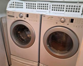#143 LG Tromm Supercapacity Washer & Dryer w/pedestals matching set $600.00