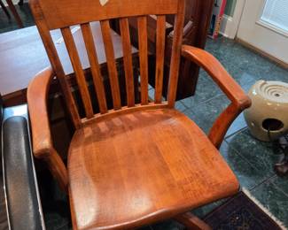 #132 Wooden rolling Office Chair - Vintage $150.00