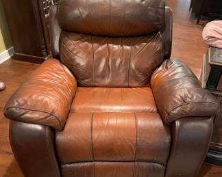 Brown recliner with a few perfections