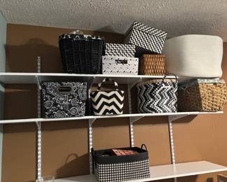 tons and tons of organizing bins, decorative and also rubbermaid containers with lids