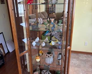 tons of owls and bird figurines