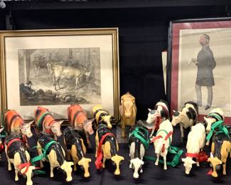 Herd of plastic cows and pictures