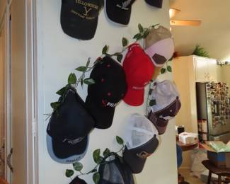 Baseball caps and visors from travel destinations.