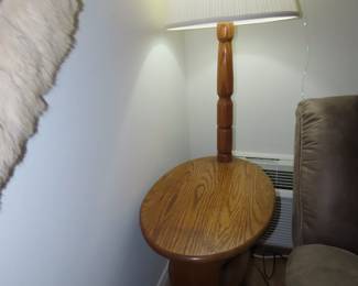 One of two matching tables/magazine racks with light.