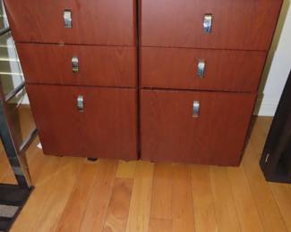 Two matching file cabinets.