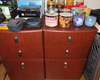 Matching file cabi nets and lots of new unused high end fragrant candles. Nikon Coolpix camera. and binoculars.