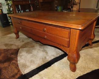 Coffee table with drawers.
