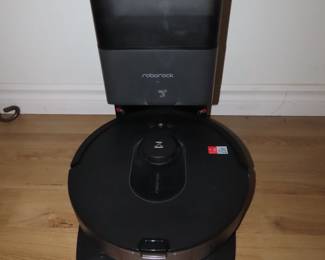 Roborock "Roomba Style" vacuum.