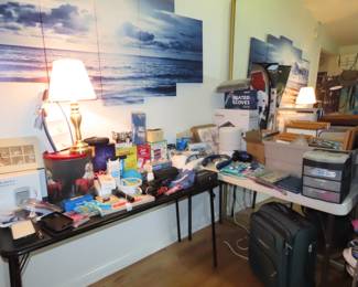 Brand new items, phone cases, passport holders, travel fans, boxed games. Sewing drawers, photo frames, bluetooth earphones, . Lots of new items.