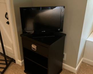 Small Sony tv with end table