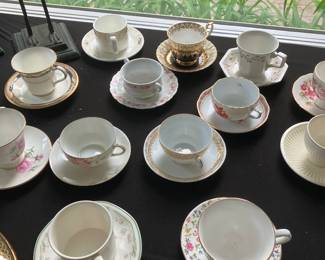 An assortment of fine bone china tea cups and saucers