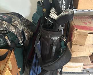 2 sets of golf clubs