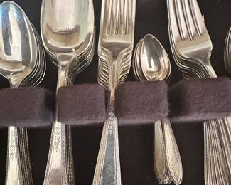 #99 - $120 - Silver flatware in case