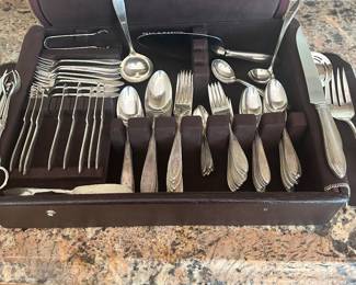 #99 - $120 - Silver flatware in case
