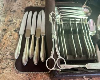 #99 - $120 - Silver flatware in case