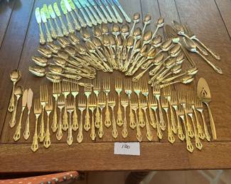 #98 - $120 - Gold plated flatware
