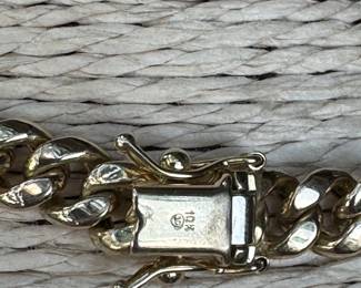 #177- $1,150 - 10kt yellow gold marked link gold chain.22.6 grams