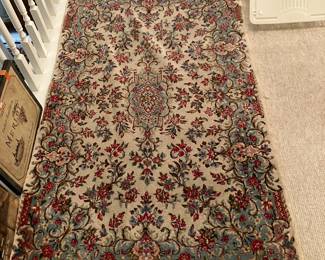 #84 - $100 - Made in Iran floral rug 64x39 - pastels in cream