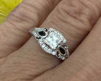 #175 - $800 - 18kt white gold ring with 1/2 ct princess center stone, sapphires on sides, size 6.5