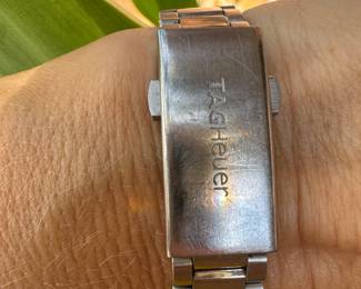 $750 - One ladies Tag Hauer stainless steel Aquaracer . Way 1412 - Serial RZE6771 - watch has mother of pearl dial, rotating bezel, sapphire crystal and the BA0920 stainless steel bracelet. Bere Appraisal included with your purchase.