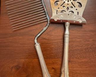 Sterling handles 1 angel hair cake cutter & one asparagus server $50