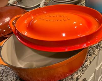 #114 - $150- Cousances Doufeu France #12 orange oval dutch oven - 11"