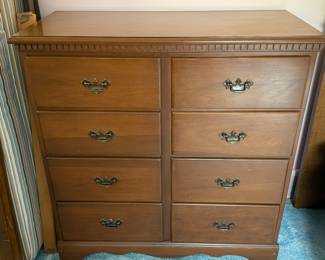 This is an eight drawer dresser in excellent condition