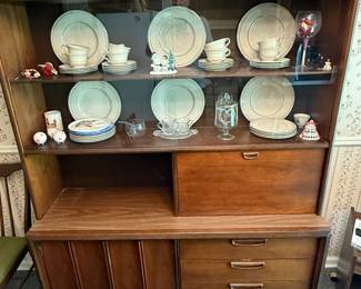 This is a beautiful mid-century modern wall unit two shelves with glass sliding doors and open shelf a shelf, drop-down door, three drawers and two cabinet cabinets! It is an excellent
