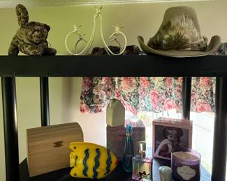 We have candles, perfume, picture, frames, and more