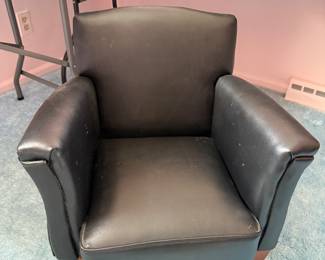 This is a sweet little leather rocker for a child