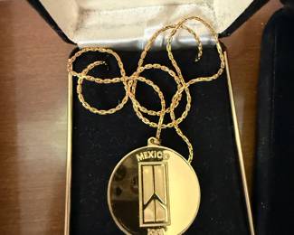 This is a beautiful Mexico, gold coin necklace