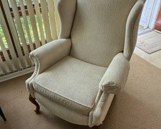 Is a beautiful white, beige wingback chair!