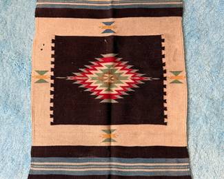 This is a vintage Mexican war rug!