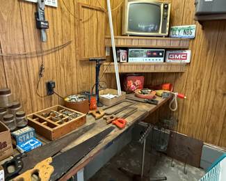 The garage has lots of vintage tools and assorted items