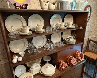 Here is that beautiful mid-century modern China cabinet now displayed with lots of good goodies
