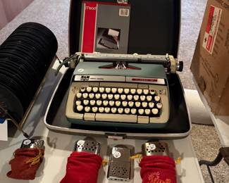 Here’s a nice Smith Corona typewriter and it’s original case and some great vintage handwarmers
