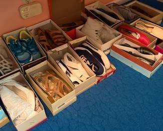 Lots of shoes above and below the tables