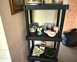This shelf is filled with nothing but small Christmas goodies