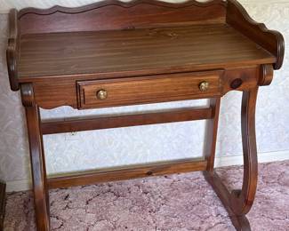 A cute little side table with drawer