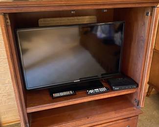 Inside of Entertainment Cabinet, Large Samsung Color TV