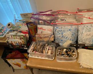 Sewing items, patterns, and lots of bedding
