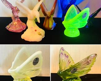 Fenton blue and green uranium glass figurines . Plus Fenton glass hummingbirds.