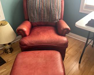 Hancock & Moore burgundy press back chair and ottoman.