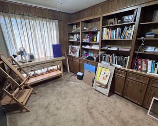 Workbench with accessories, easel, books, office supplies